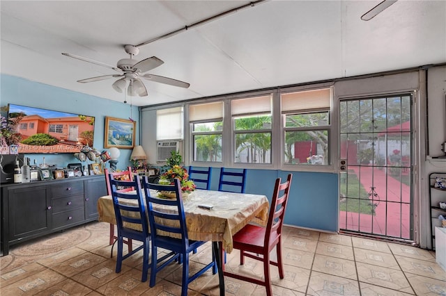 dining area with a ceiling fan and cooling unit