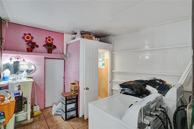 laundry room featuring laundry area and washing machine and clothes dryer