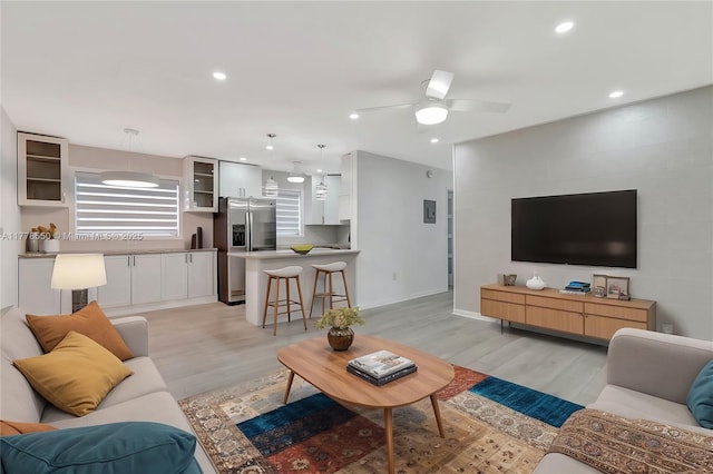 15600 NE 6th Ave Unit 30A, Miami, FL 33162 - living area featuring light wood-style flooring, recessed lighting, baseboards, and a ceiling fan