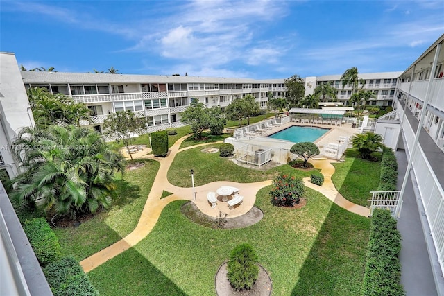15600 NE 6th Ave Unit 30A, Miami, FL 33162 - exterior space with a patio area, fence, and a lawn