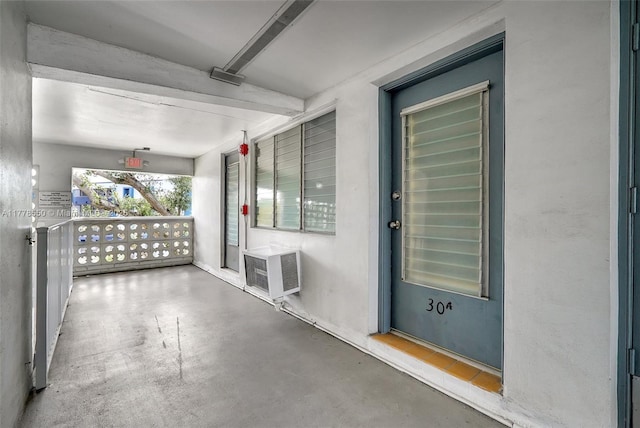15600 NE 6th Ave Unit 30A, Miami, FL 33162 - property entrance featuring covered porch and an AC wall unit