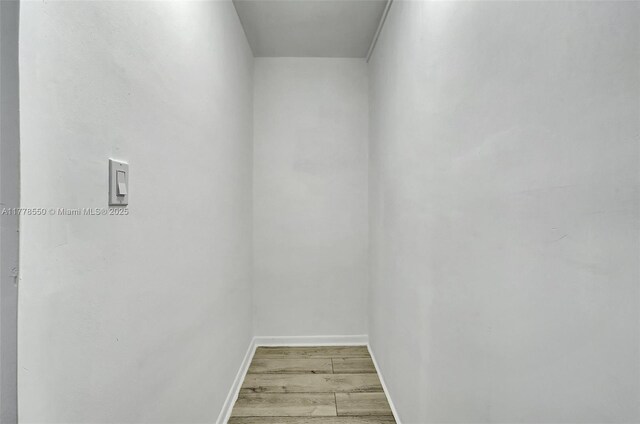 15600 NE 6th Ave Unit 30A, Miami, FL 33162 - interior space with baseboards and wood finished floors