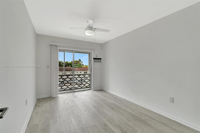 15600 NE 6th Ave Unit 30A, Miami, FL 33162 - empty room featuring light wood finished floors, baseboards, and a ceiling fan