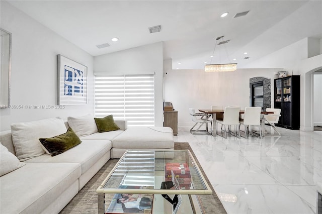 living area with recessed lighting, visible vents, marble finish floor, and lofted ceiling