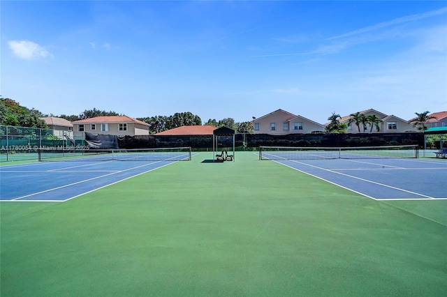 view of sport court with fence and community basketball court