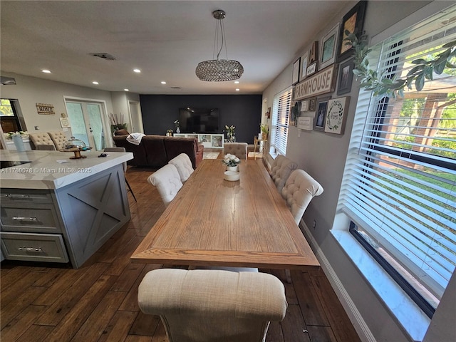 dining area featuring dark wood-style floors, visible vents, and recessed lighting
