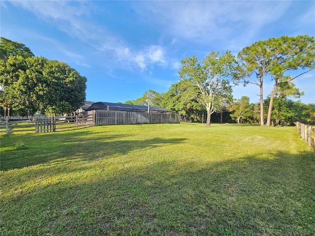 view of yard with fence