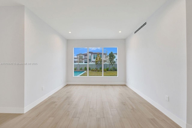 3527 Forest View Cir, Dania Beach, FL 33312 - empty room featuring recessed lighting, baseboards, and light wood-style flooring