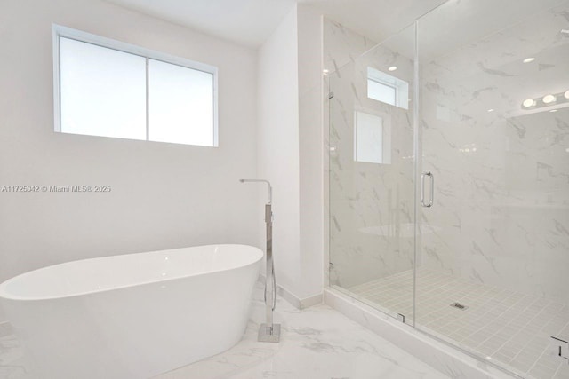 3527 Forest View Cir, Dania Beach, FL 33312 - full bathroom with a soaking tub, baseboards, marble finish floor, and a marble finish shower