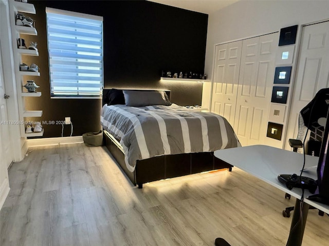 10060 NW 86th Ter, Doral, FL 33178 - bedroom with a closet and wood finished floors