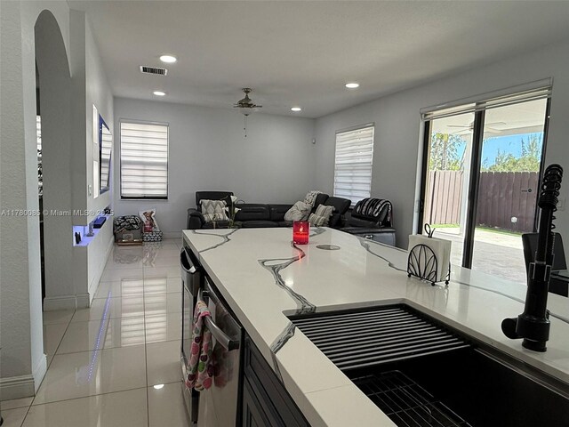 10060 NW 86th Ter, Doral, FL 33178 - kitchen featuring plenty of natural light, light countertops, ceiling fan, open floor plan, and recessed lighting