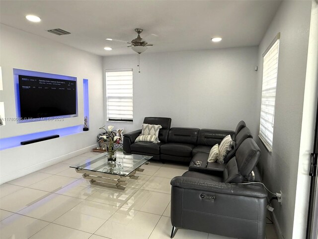 10060 NW 86th Ter, Doral, FL 33178 - living room with ceiling fan, tile patterned flooring, recessed lighting, and baseboards