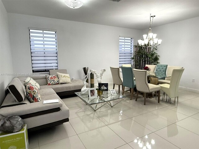 10060 NW 86th Ter, Doral, FL 33178 - living room featuring a chandelier, light tile patterned floors, and baseboards