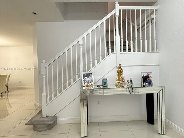 10060 NW 86th Ter, Doral, FL 33178 - stairs with baseboards and tile patterned floors
