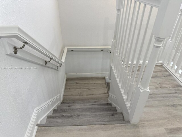 10060 NW 86th Ter, Doral, FL 33178 - stairs with wood finished floors and baseboards