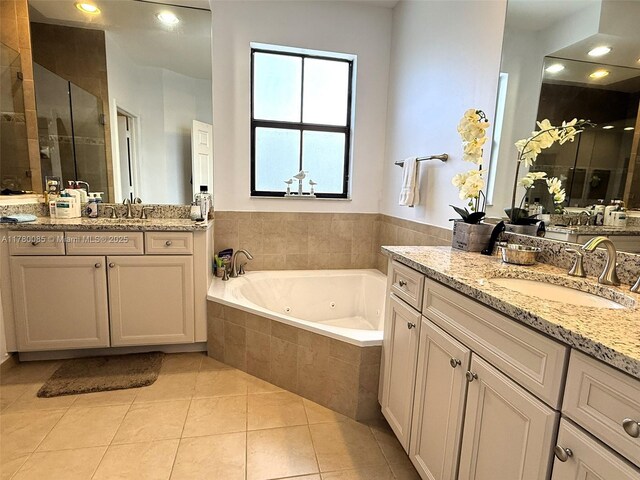 10060 NW 86th Ter, Doral, FL 33178 - bathroom featuring a stall shower, two vanities, a jetted tub, tile patterned flooring, and recessed lighting