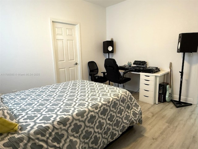 10060 NW 86th Ter, Doral, FL 33178 - bedroom with light wood-type flooring and baseboards