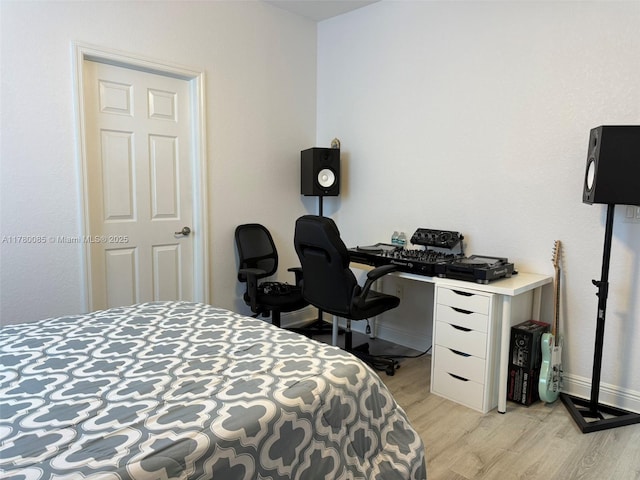 10060 NW 86th Ter, Doral, FL 33178 - bedroom with light wood-style flooring and baseboards