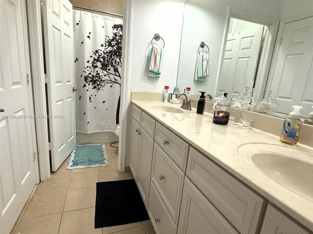 10060 NW 86th Ter, Doral, FL 33178 - full bath with tile patterned floors, double vanity, toilet, and a shower with curtain