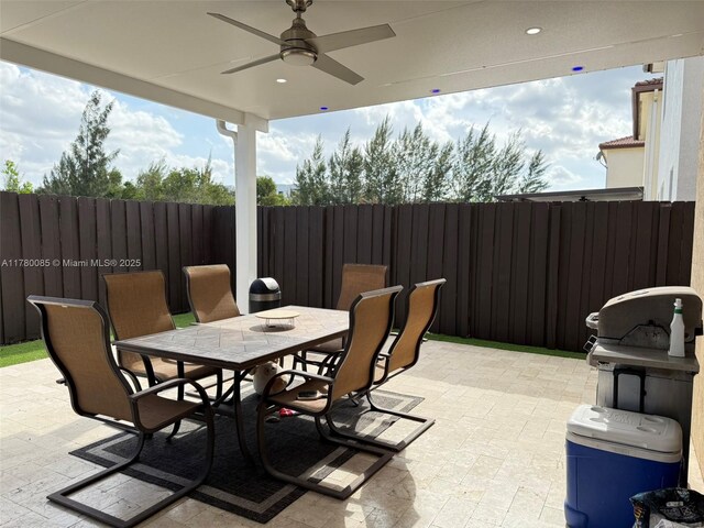 10060 NW 86th Ter, Doral, FL 33178 - view of patio featuring outdoor dining area and ceiling fan