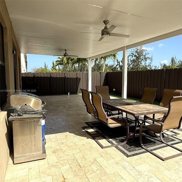 10060 NW 86th Ter, Doral, FL 33178 - view of patio / terrace featuring outdoor dining area, a ceiling fan, and grilling area