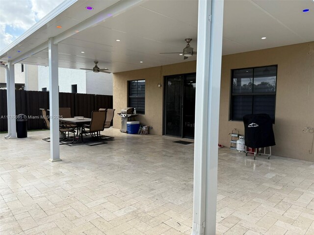 10060 NW 86th Ter, Doral, FL 33178 - view of patio featuring ceiling fan, outdoor dining area, and a grill