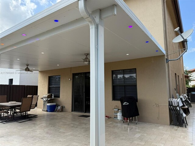 10060 NW 86th Ter, Doral, FL 33178 - view of patio / terrace featuring a grill, a ceiling fan, and outdoor dining area
