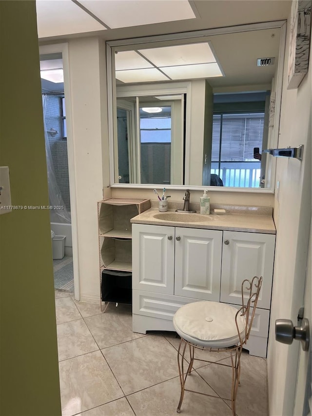 18555 NE 14th Ave Unit 516, Miami, FL 33179 - bathroom with visible vents, vanity, and tile patterned flooring