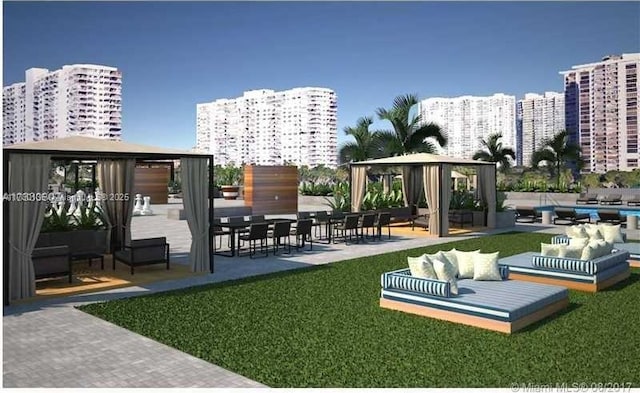 18061 Biscayne Blvd Unit 802, Aventura, FL 33160 - view of community featuring a gazebo, outdoor lounge area, a view of city, and a lawn