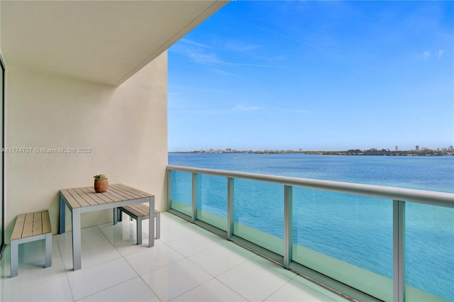 balcony featuring a water view