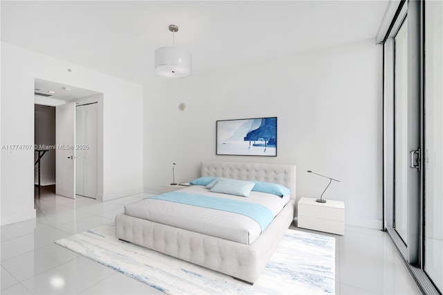 bedroom featuring tile patterned floors