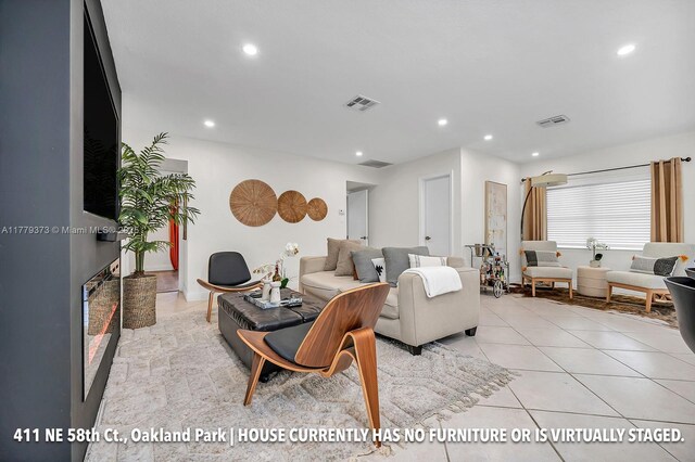 411 NE 58th Ct, Oakland Park, FL 33334 - living room with recessed lighting and visible vents