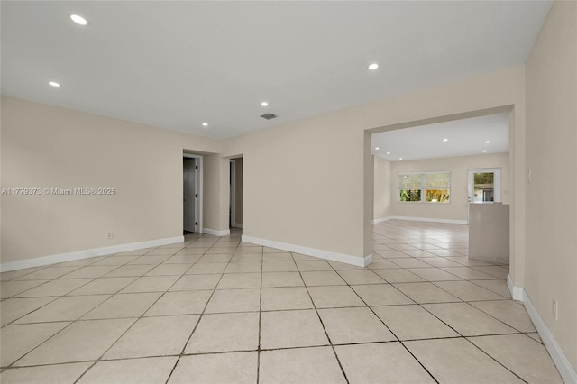 411 NE 58th Ct, Oakland Park, FL 33334 - empty room with baseboards, recessed lighting, visible vents, and light tile patterned flooring