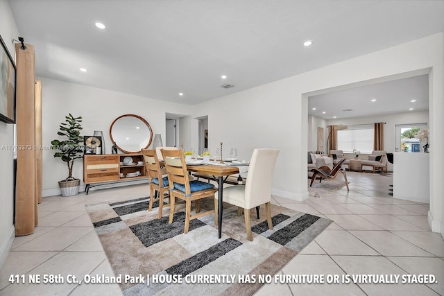 411 NE 58th Ct, Oakland Park, FL 33334 - dining area with visible vents, baseboards, light tile patterned floors, and recessed lighting
