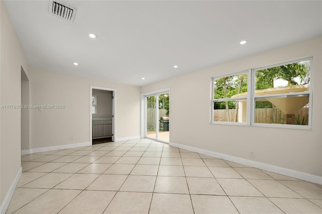 411 NE 58th Ct, Oakland Park, FL 33334 - spare room featuring baseboards, recessed lighting, visible vents, and light tile patterned flooring