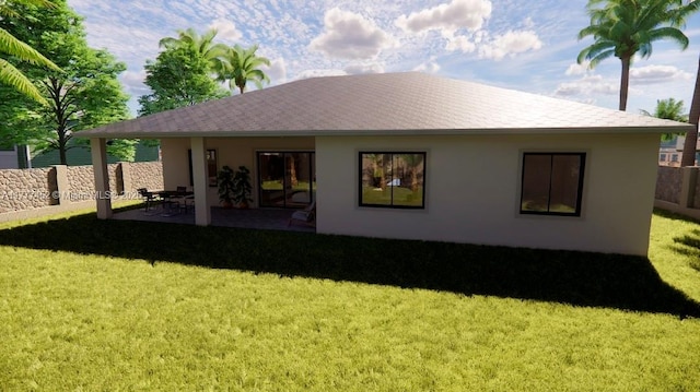 back of house featuring a patio, a yard, stucco siding, and fence