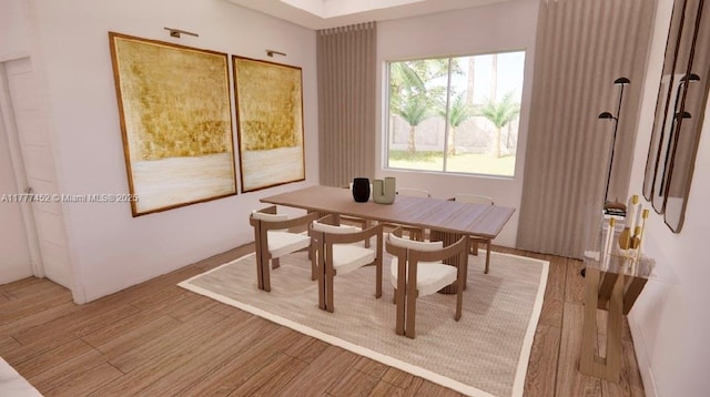 dining room with light wood-type flooring