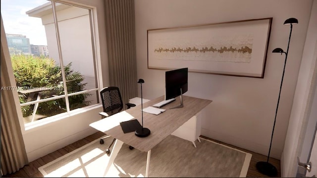 office area featuring plenty of natural light and wood finished floors