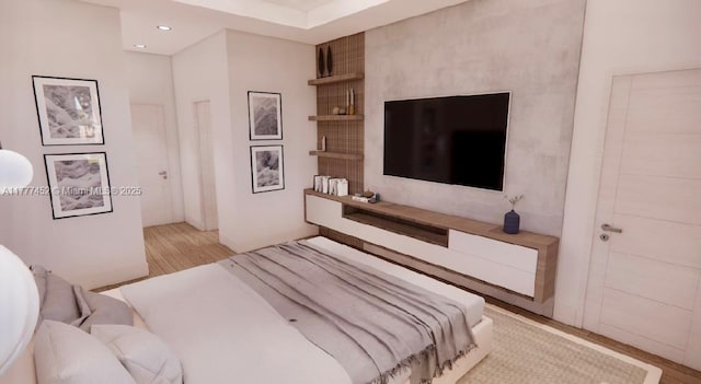 bedroom with recessed lighting and wood finished floors