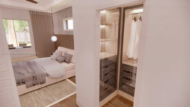 bedroom featuring wood finished floors