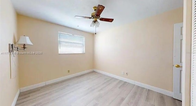 1424 Margina Ave, Daytona Beach, FL 32114 - empty room featuring light wood-style flooring, baseboards, and a ceiling fan