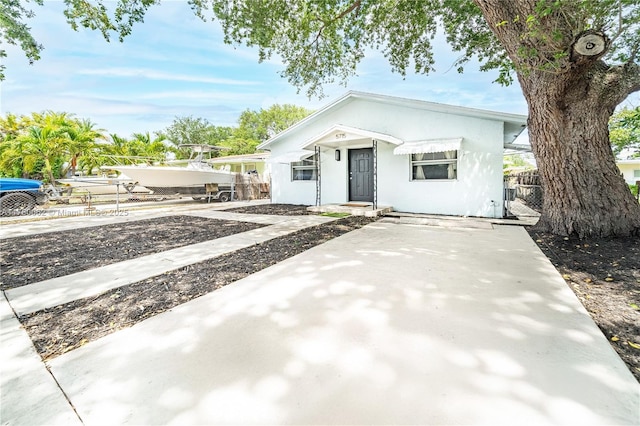 5715 Garfield St, Hollywood, FL 33021 - bungalow-style house featuring fence and stucco siding