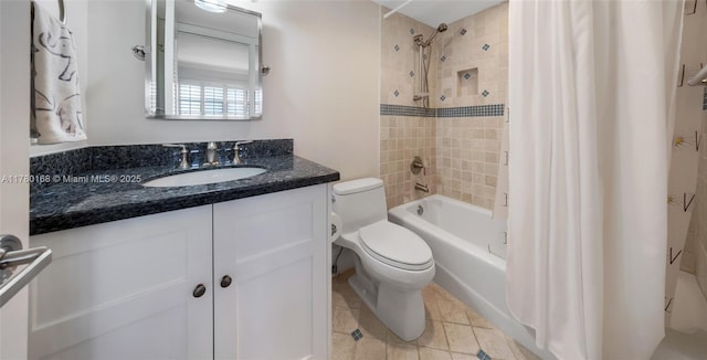 full bathroom featuring shower / bath combo, toilet, and vanity