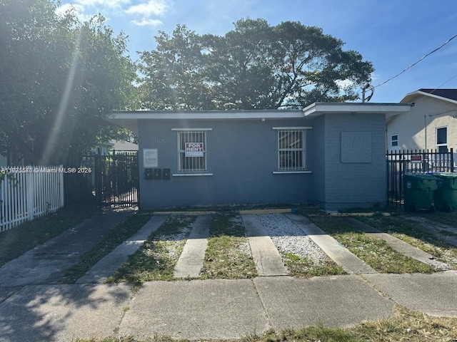 1620 NW 64th St, Miami, FL 33147 - view of front of property featuring brick siding
