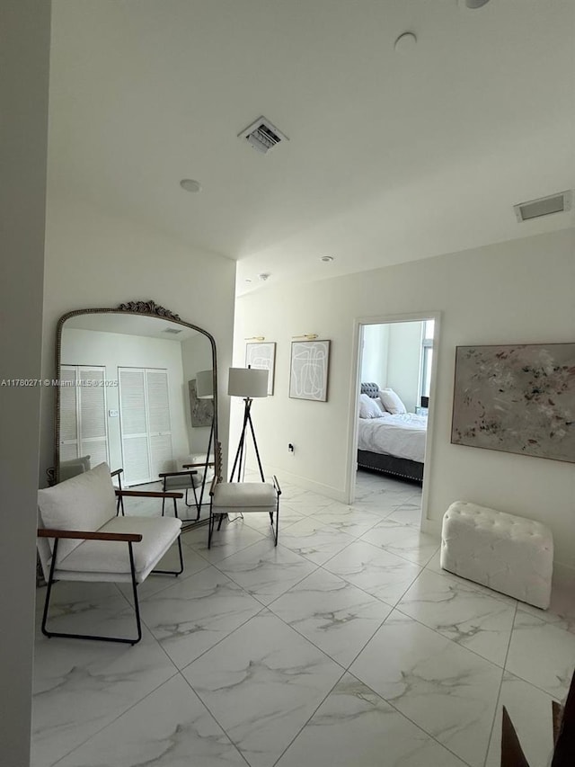 2000 Metropica Way Unit 603, Sunrise, FL 33323 - hallway featuring light marble finish floors
