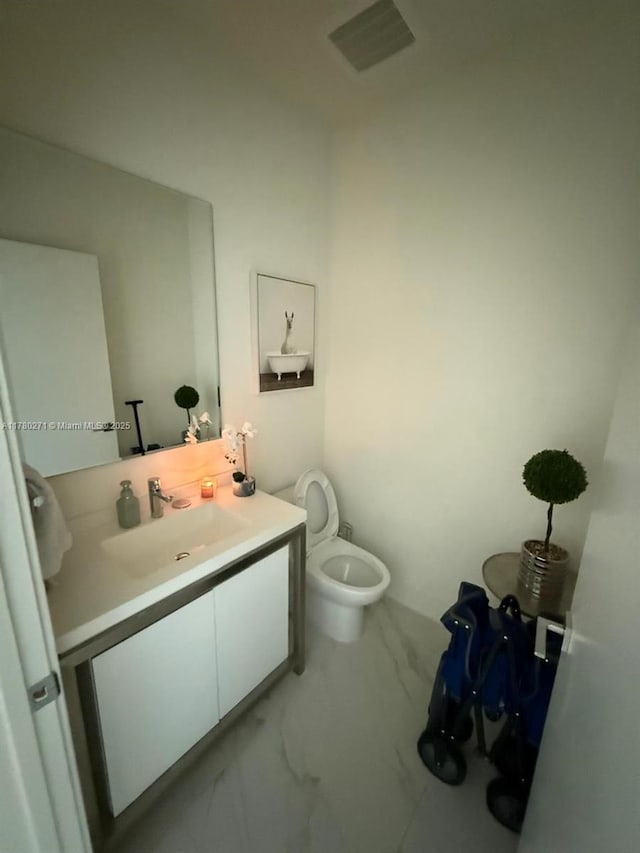 2000 Metropica Way Unit 603, Sunrise, FL 33323 - half bath with vanity and marble finish floors