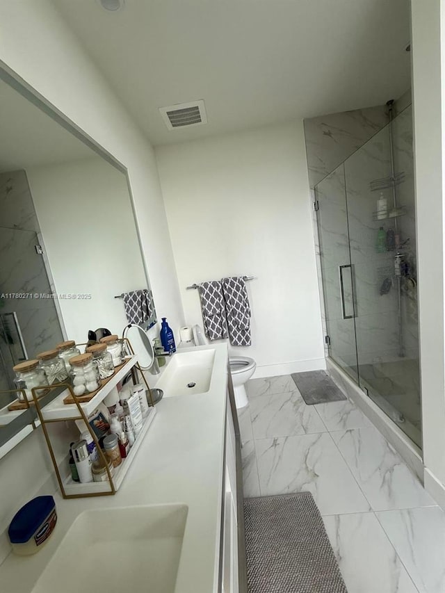 2000 Metropica Way Unit 603, Sunrise, FL 33323 - bathroom with marble finish flooring, a marble finish shower, and vanity