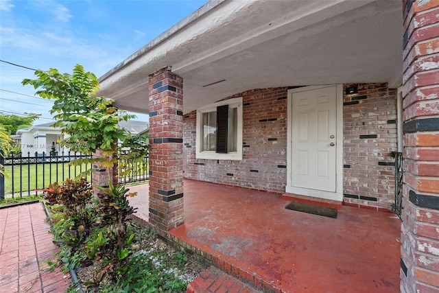 721 NW 6th St, Hallandale Beach, FL 33009 - view of patio / terrace featuring a porch and fence
