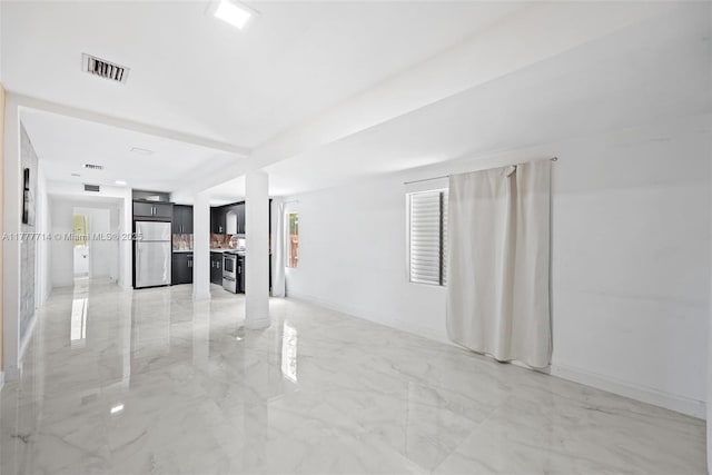 721 NW 6th St, Hallandale Beach, FL 33009 - unfurnished living room featuring marble finish floor and visible vents