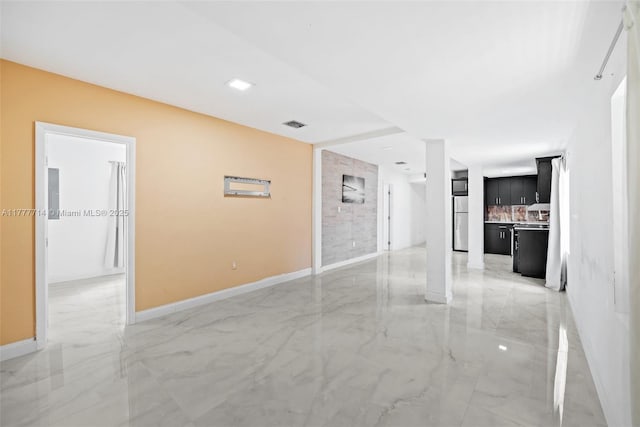 721 NW 6th St, Hallandale Beach, FL 33009 - empty room with visible vents, baseboards, and marble finish floor